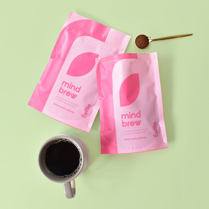 Mind brew mushroom coffee pouches with coffee cup and coffee powder